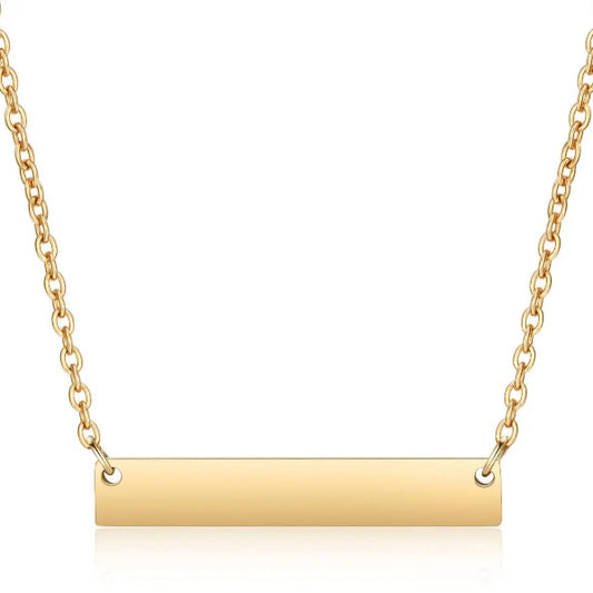 A gold-colored horizontal bar necklace made of stainless steel, displayed on a white background.